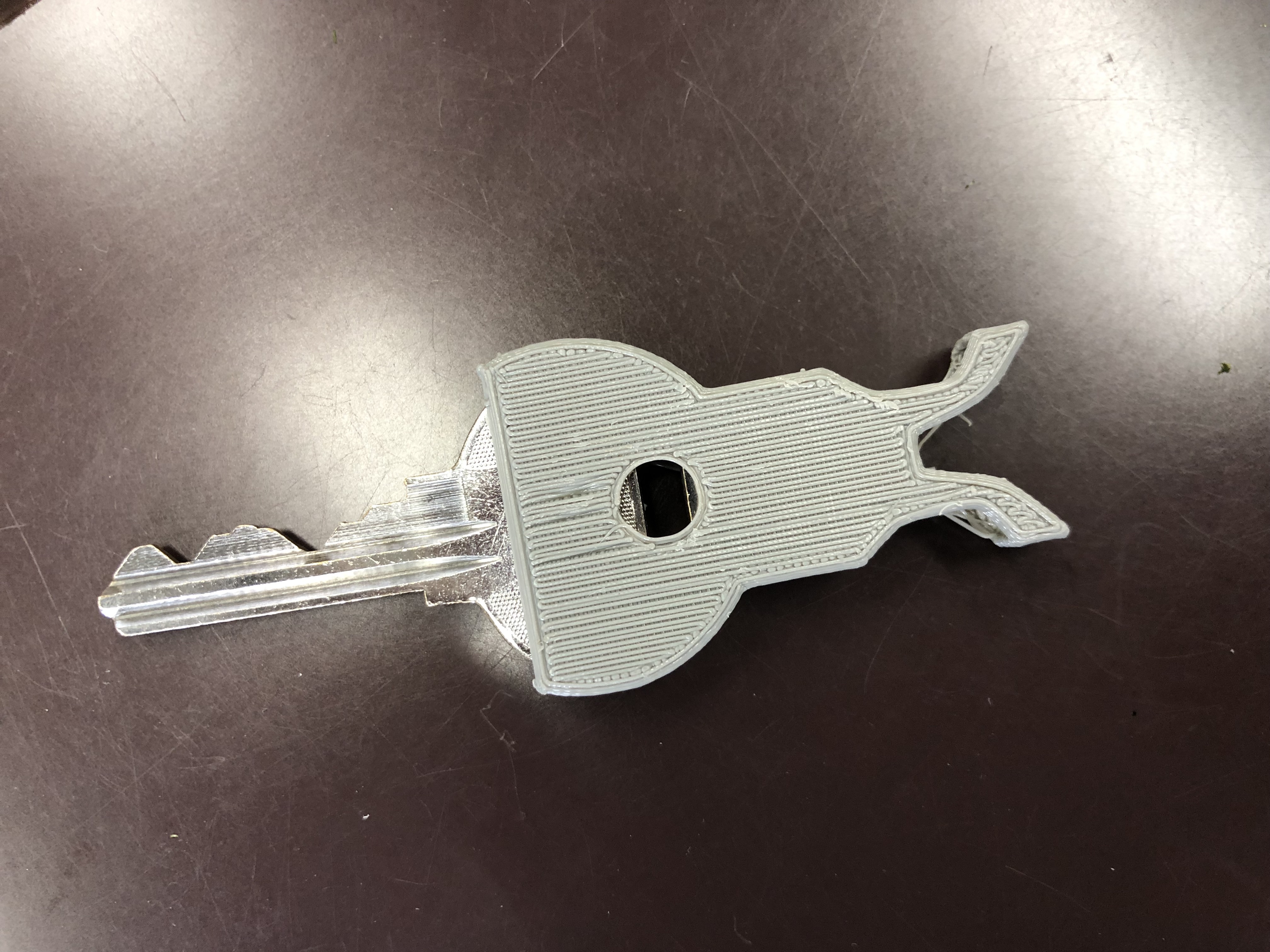 Key case with a buckle