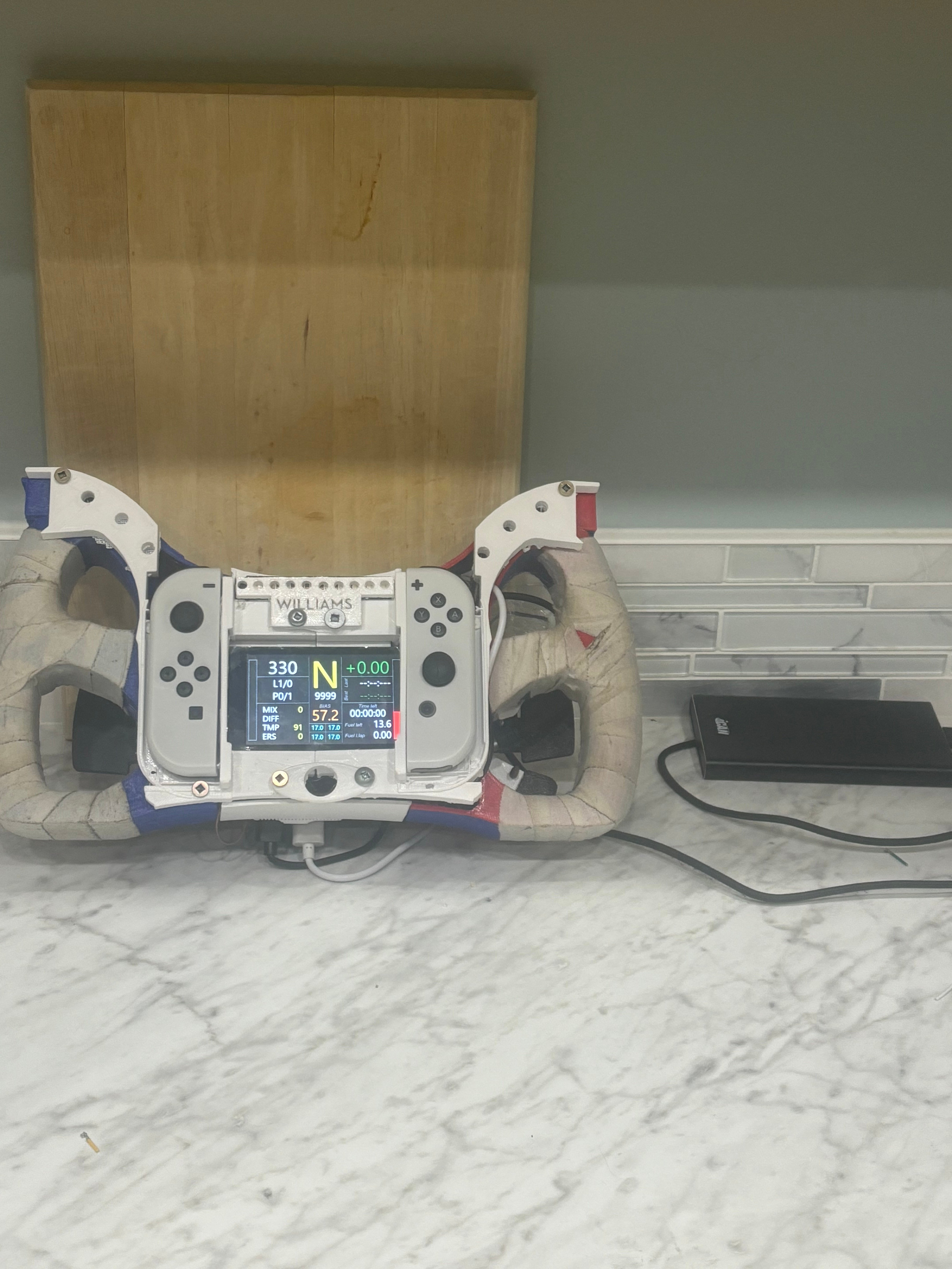 The YOJWHEEL (a Joycon FFB simracing Wheel)