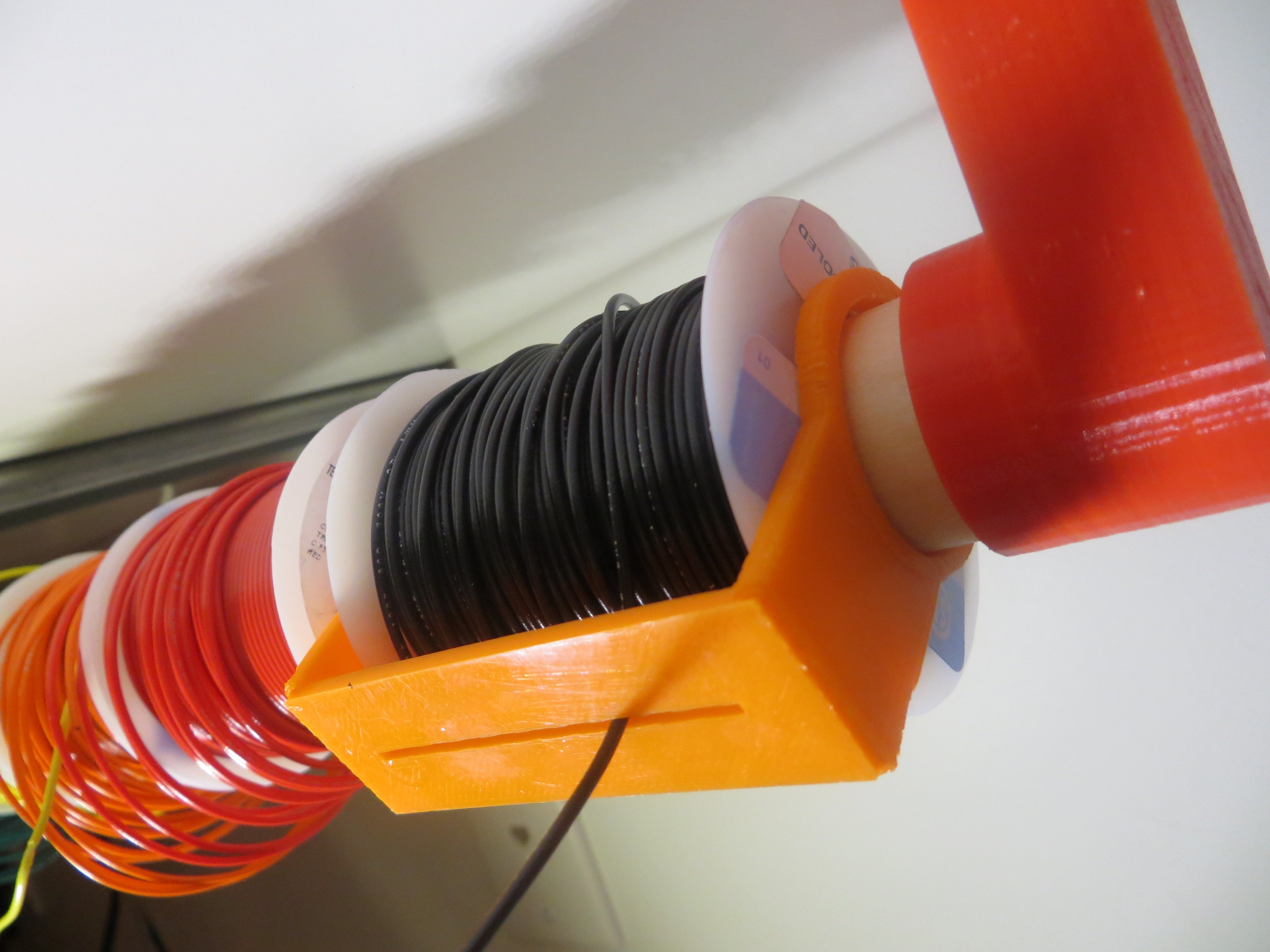 Hookup wire manager/dispenser clip