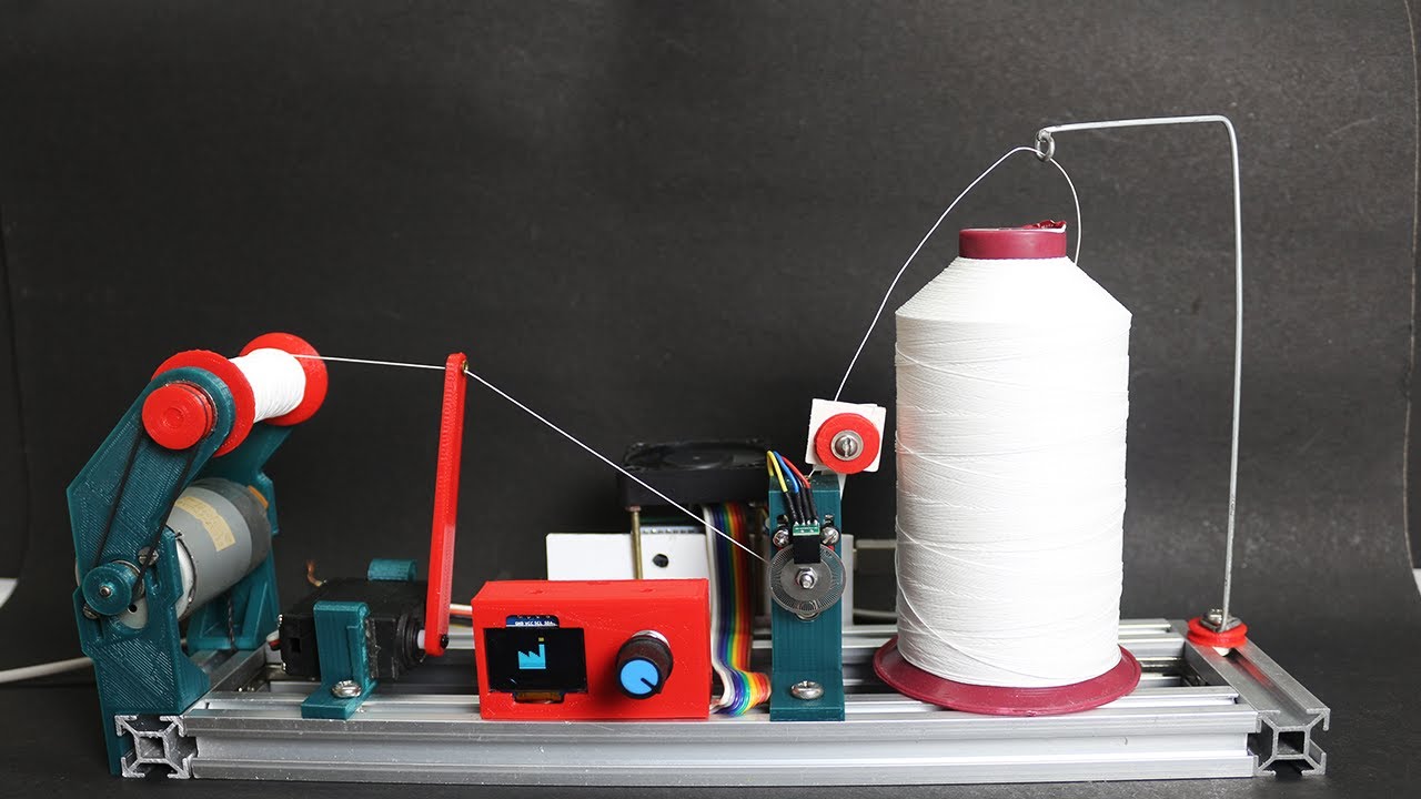 Thread coil winding machine