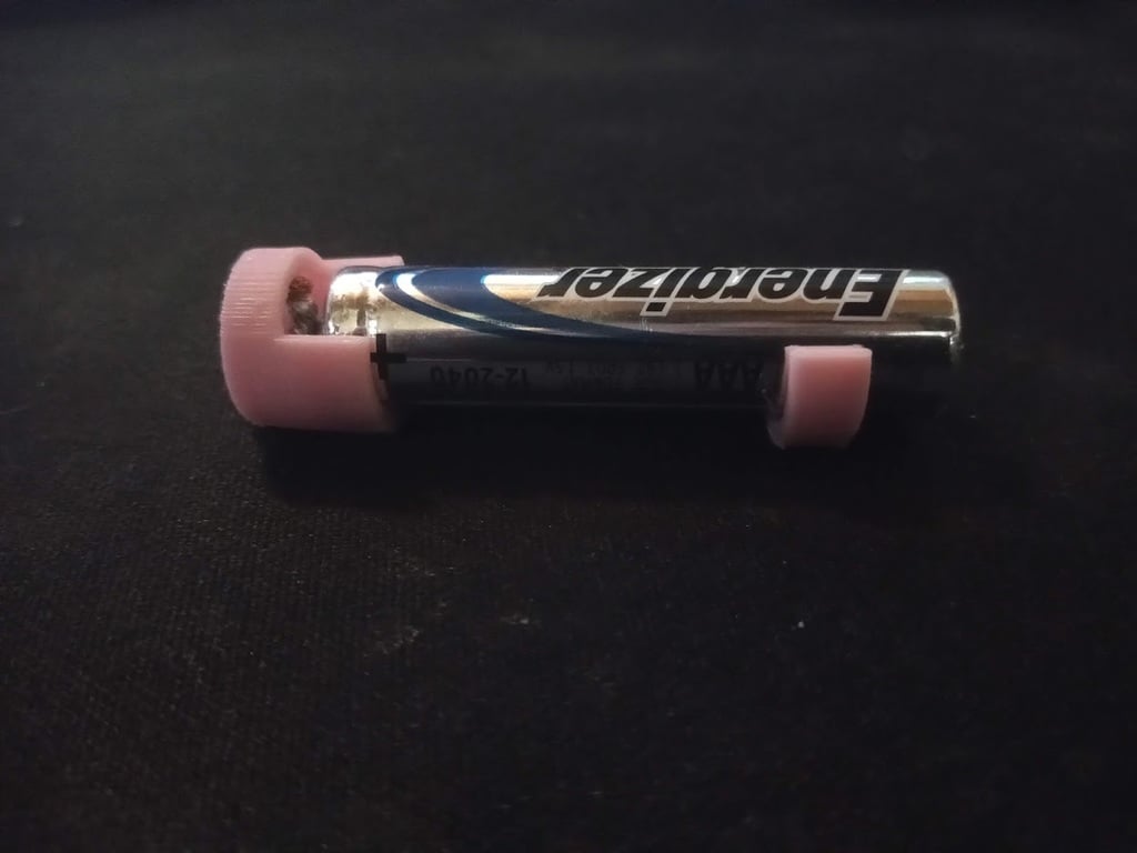 Lightweight AAA battery to AA adapter