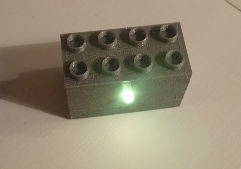 Duplo brick with RGB LED and microcontroller