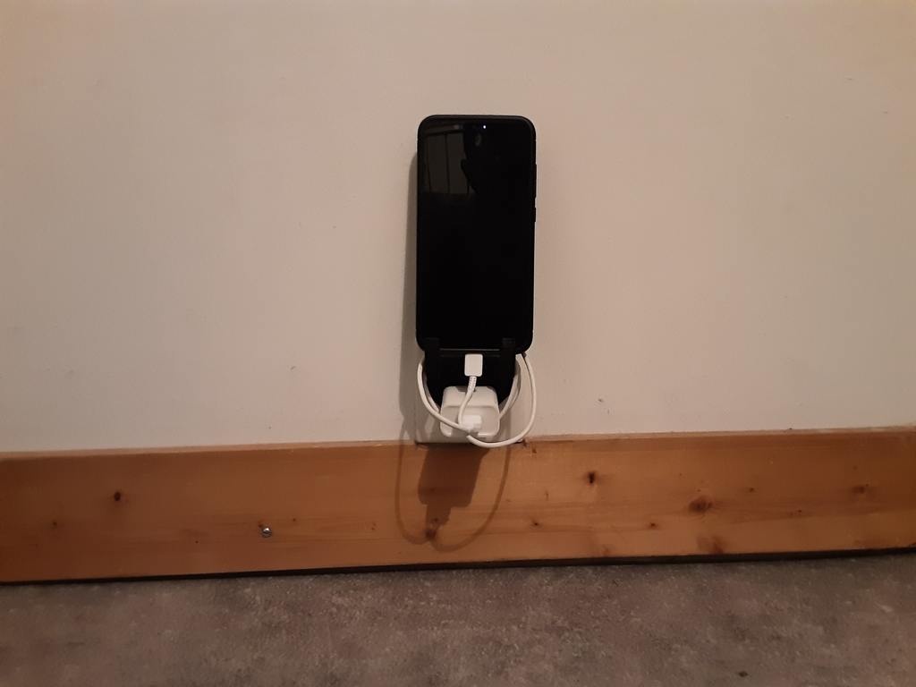 Phone holder on charger