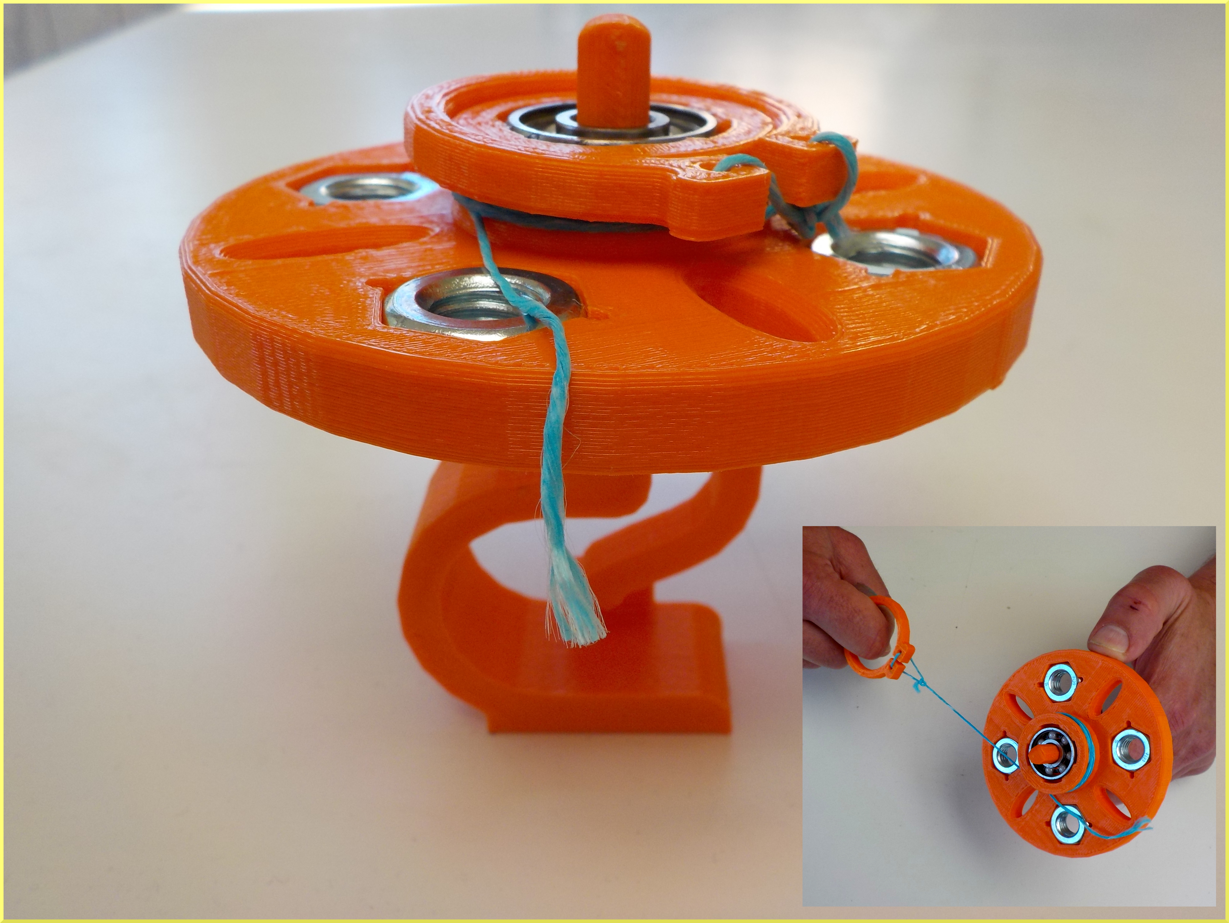 Hand spinner with string launcher