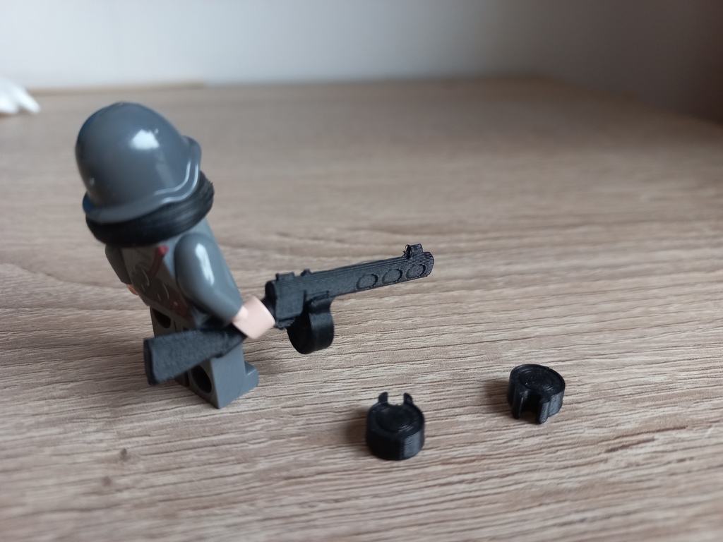 Lego gun with mountable round magazine