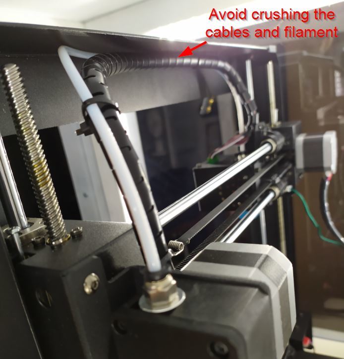 Cable & Filament Guidance to avoid crushing at upper frame