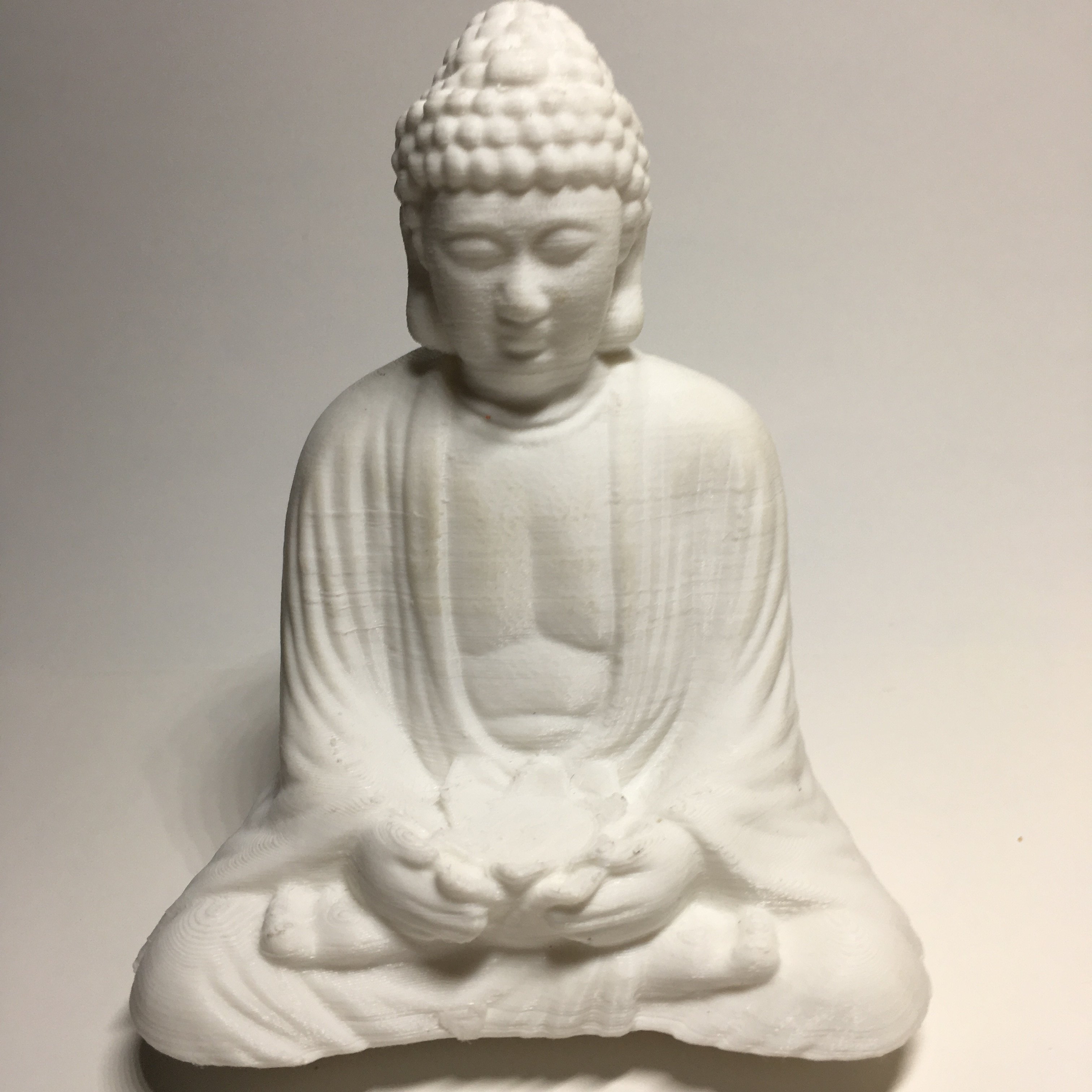 Sitting Buddha with Lotus Blossom