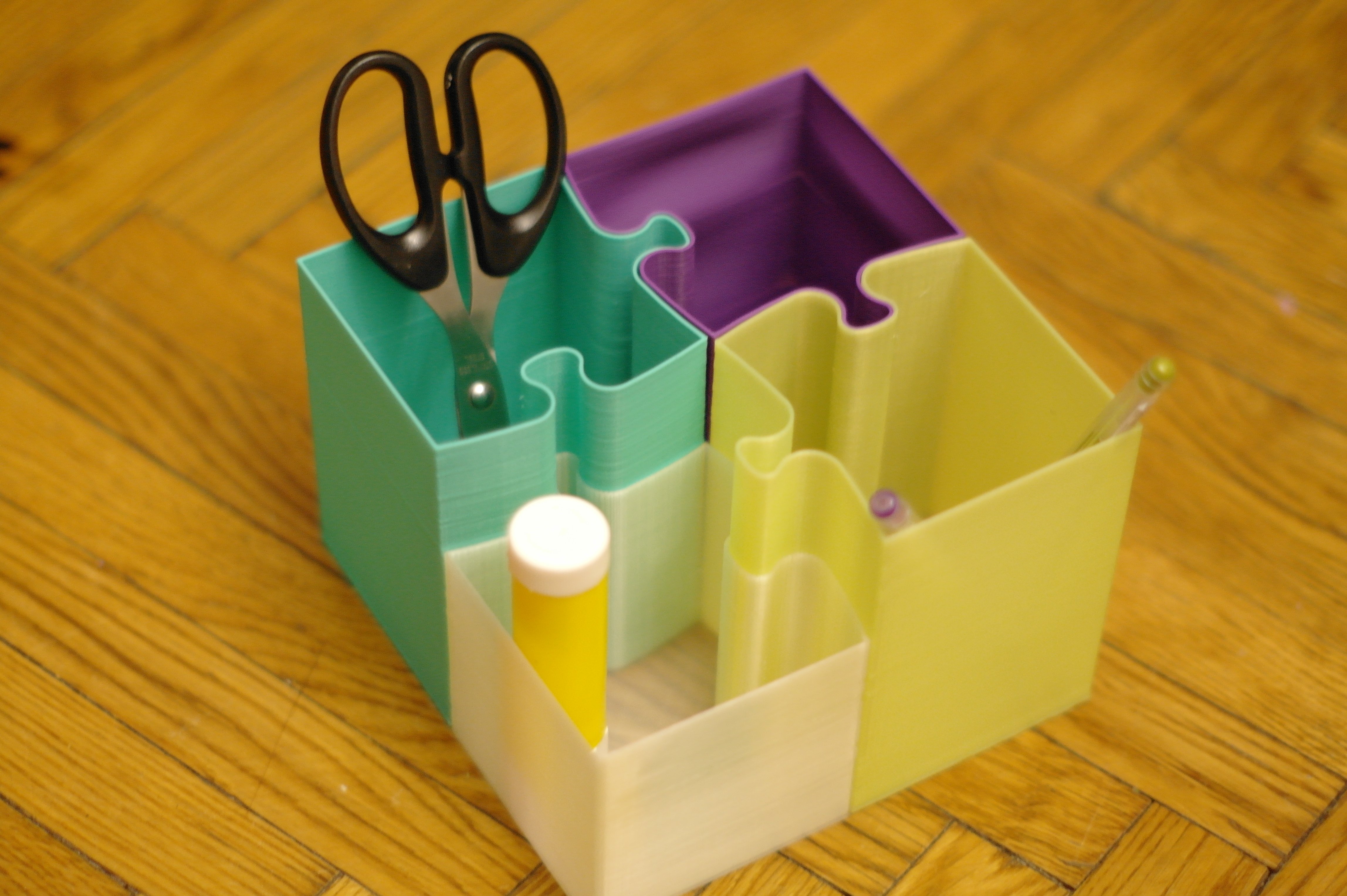 Puzzle pencil holder