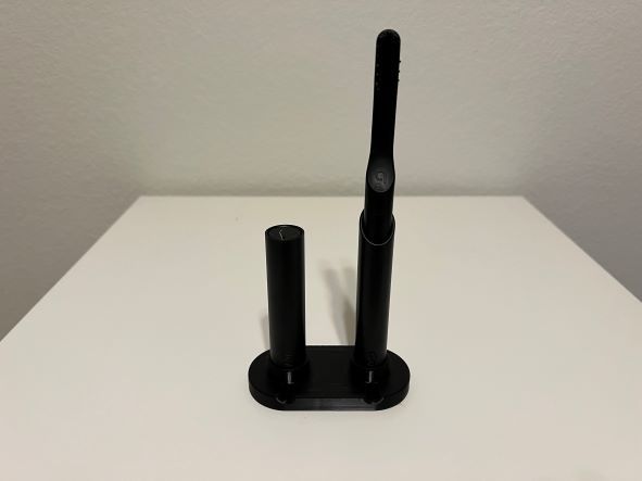 Quip toothbrush and dental floss stand