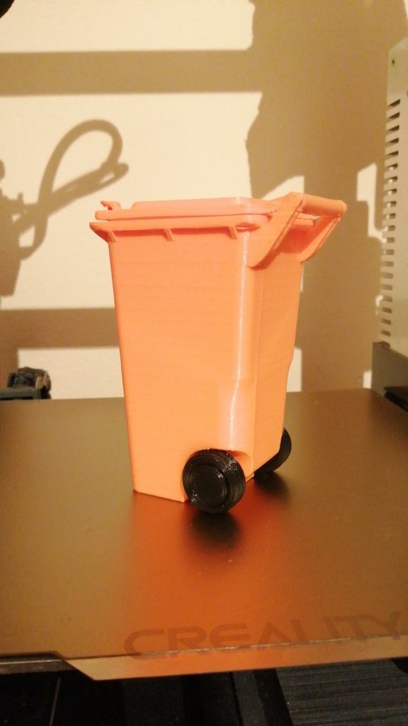 Trash Can with Moving Wheels