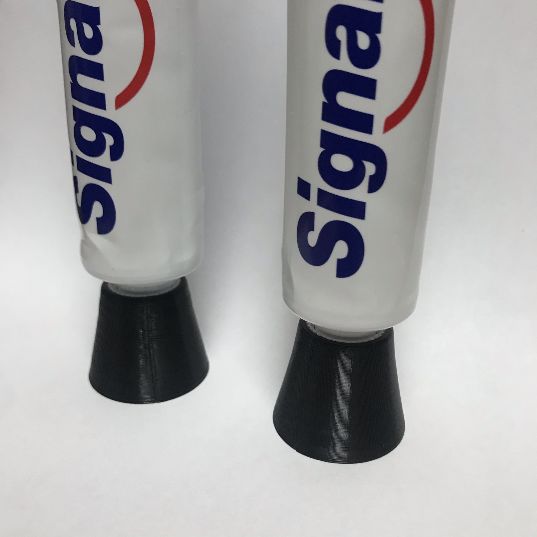 TOOTHPASTE STAND CAP