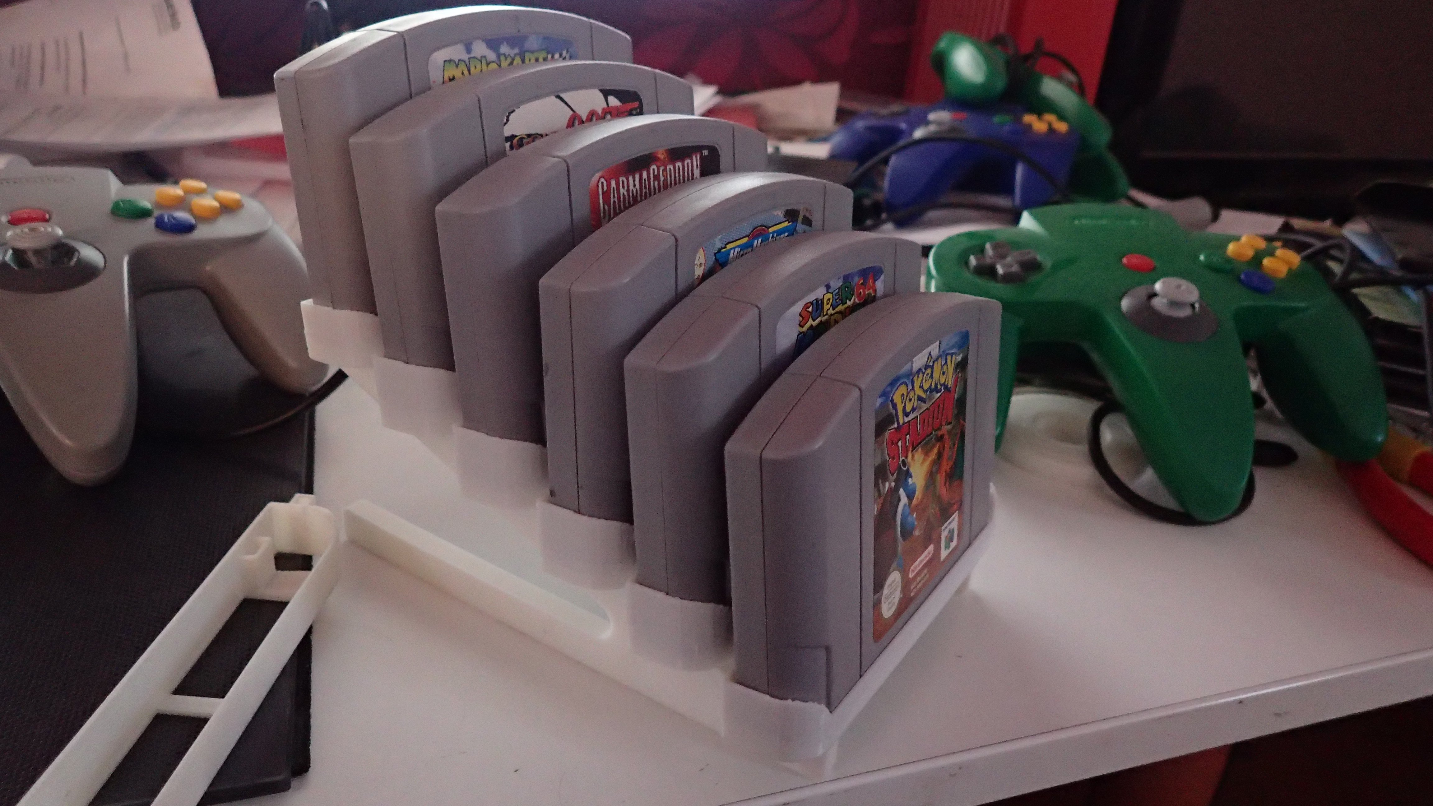Nintedo 64 game cartridge display stand PAL/JAP