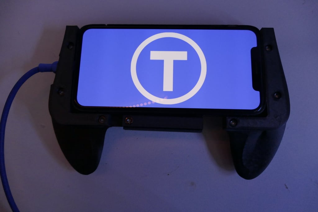 universal mobile gaming grip with charginghole