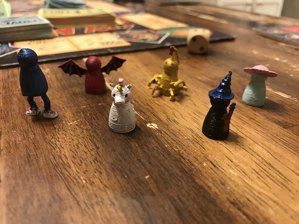 accessorized board game player pieces