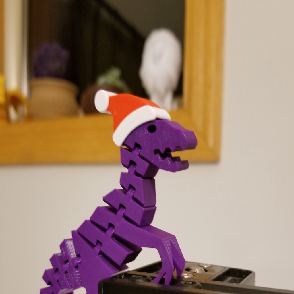 Flexi Raptor Santa Hat