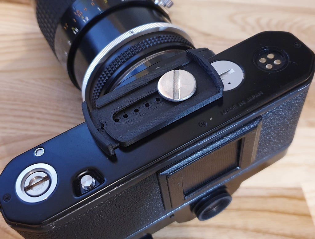 Camera Lens Cap Holder (49-82mm)