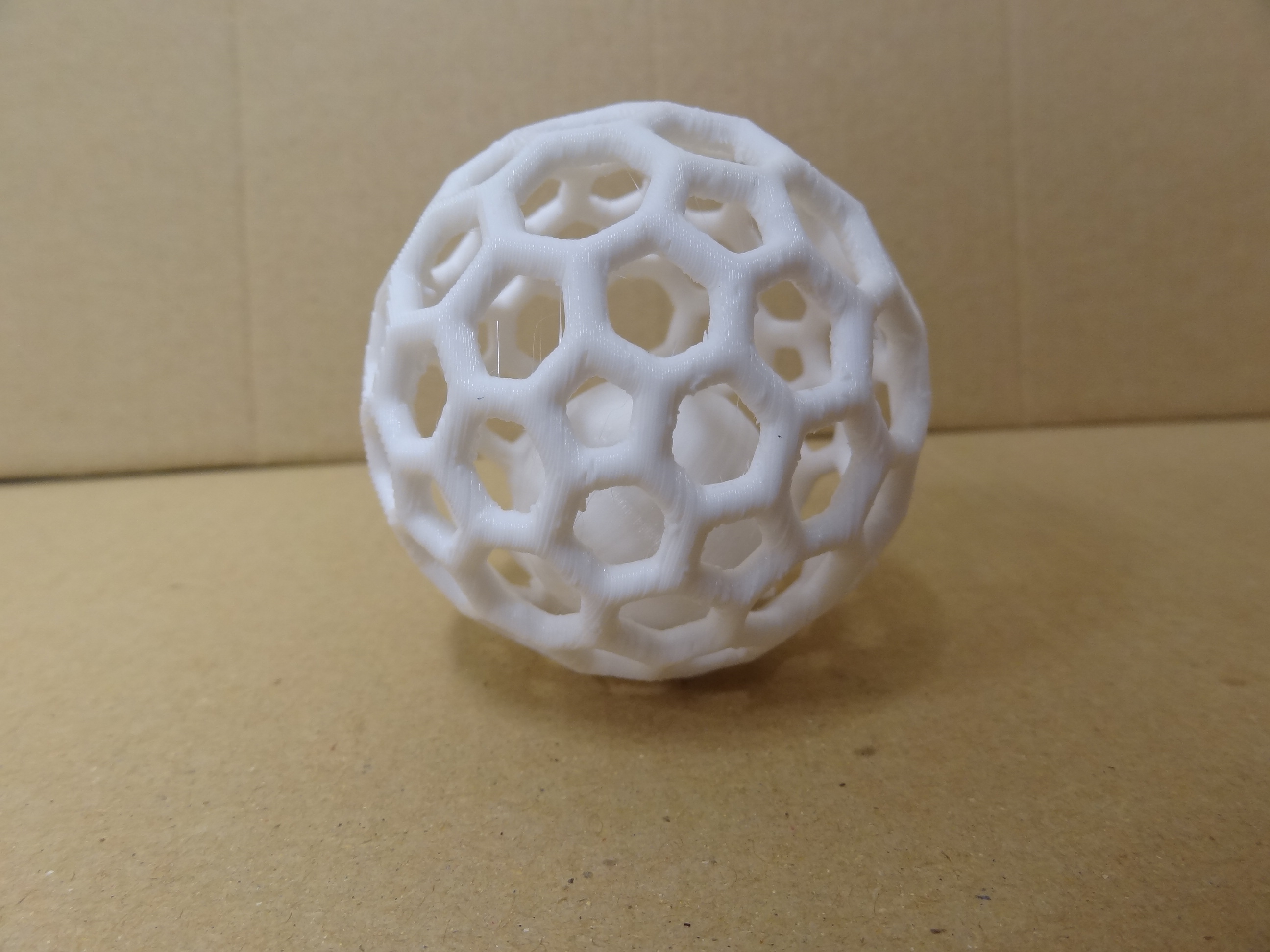 Caged ball