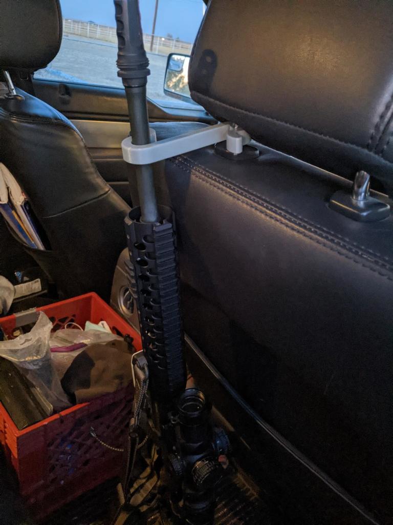 Seat-back rifle rack