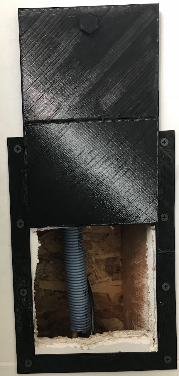 Conduit Hole Cover with Removable Door