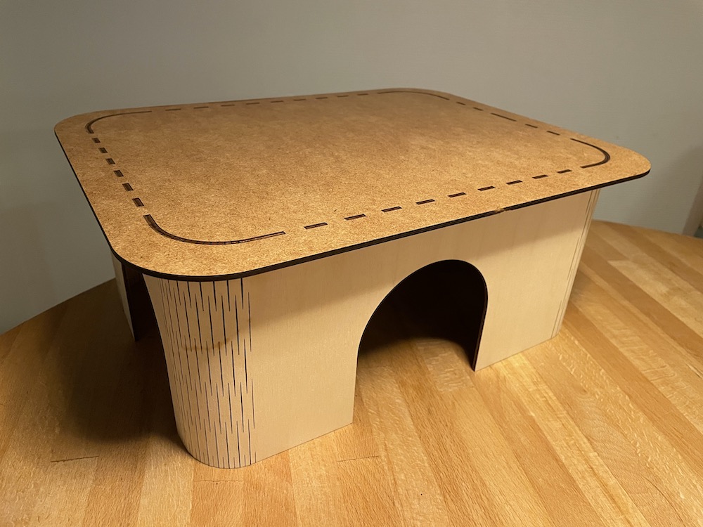 Laser cut guinea pig house with living hinge corners