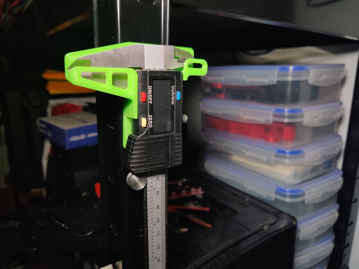 Caliper holder for metal garage shelves