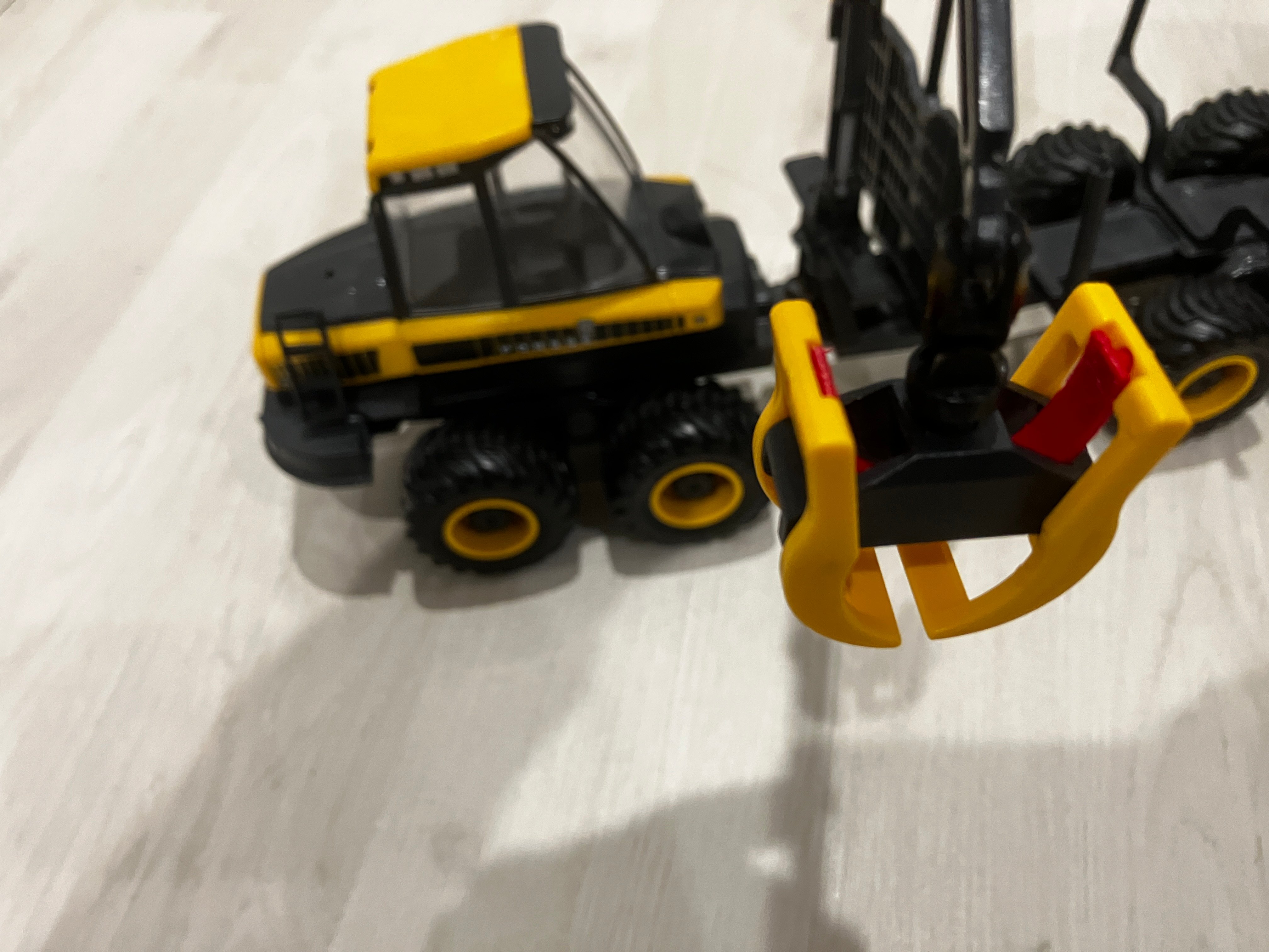 Bruder Ponsse log grapple spring