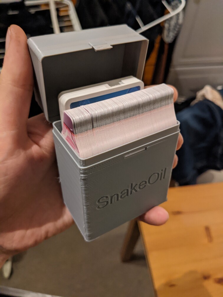 Snake Oil card game box