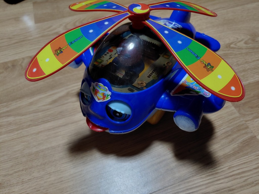 Hand Pushing Helicopter Plane Toy Wheel