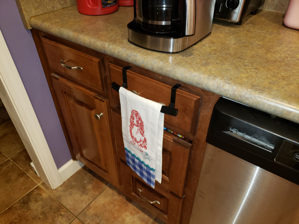 Drawer hand towel hanger