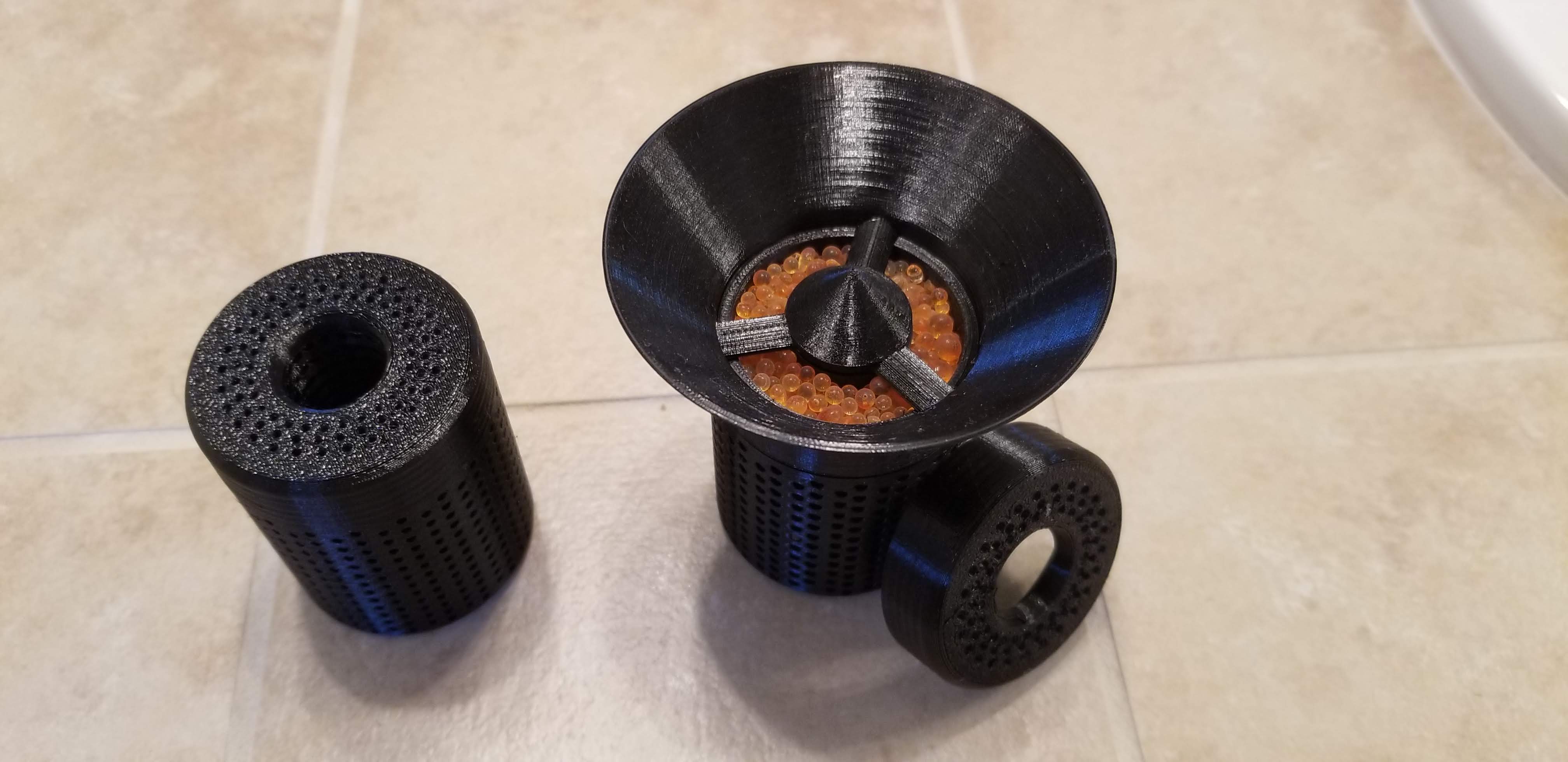 Desiccant container for spool holes