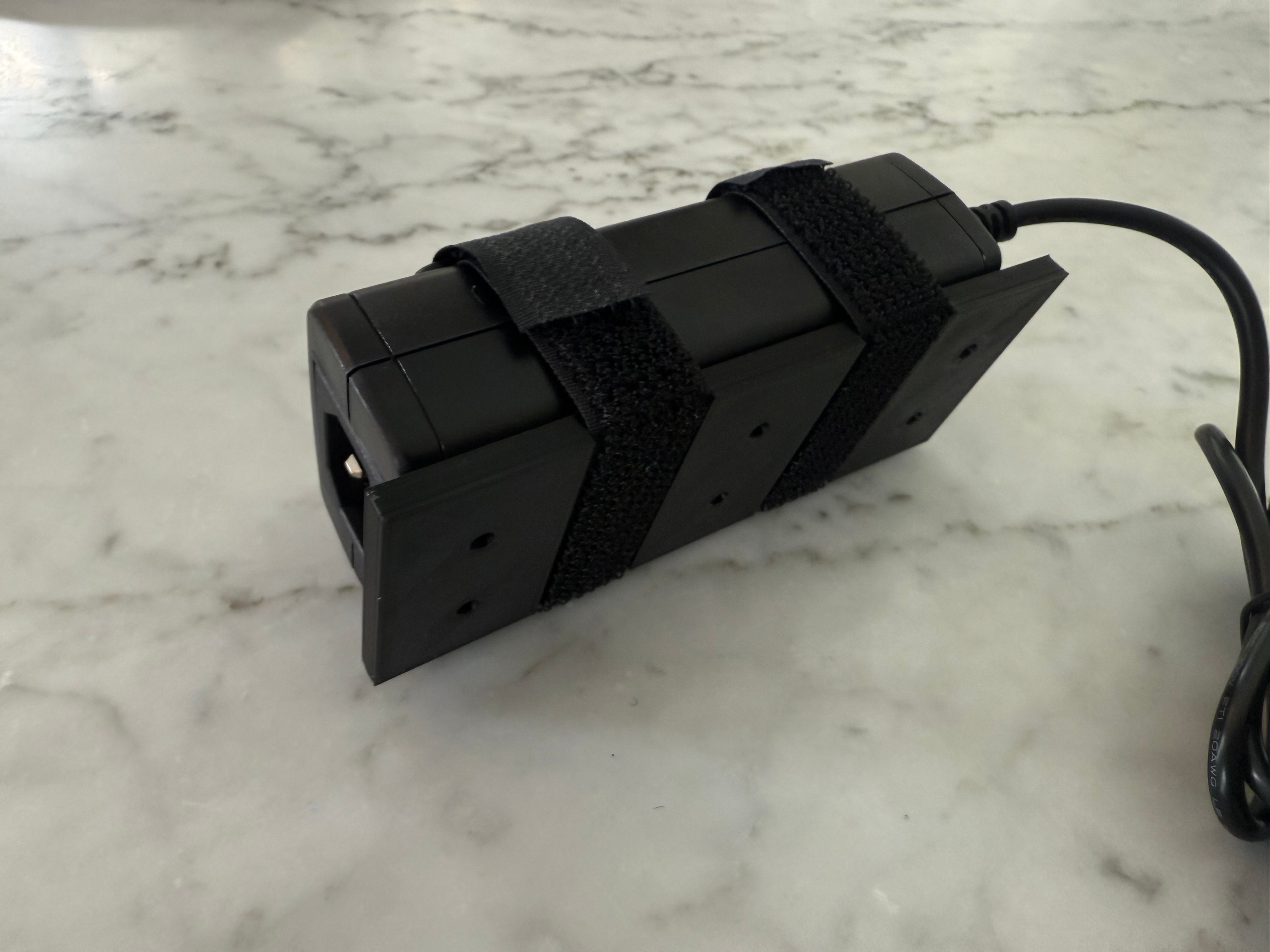 Power brick or PSU wall mount universal using Velcro double sided strap