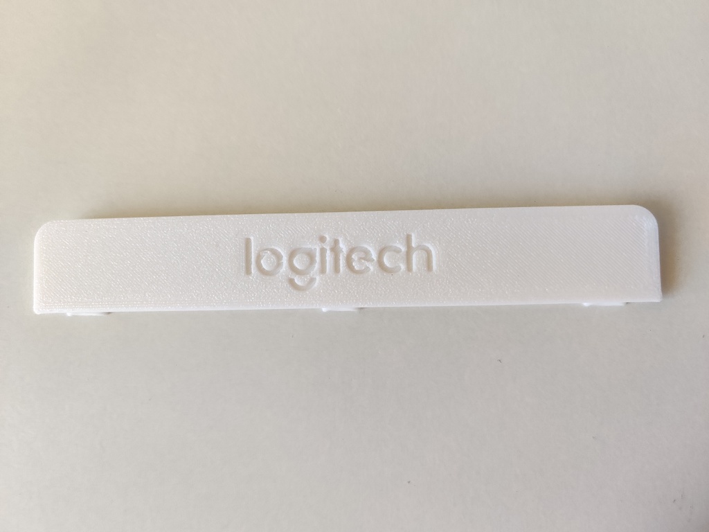 Logitech K380 battery cover with logo