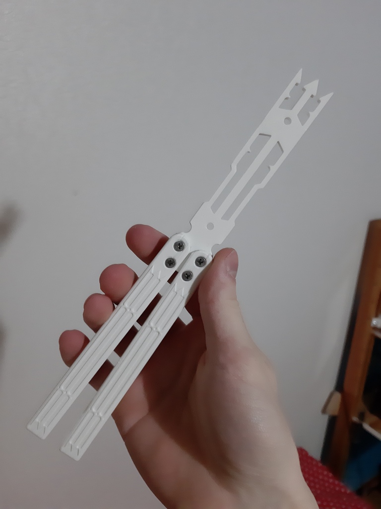 The "Atrain" balisong trainer