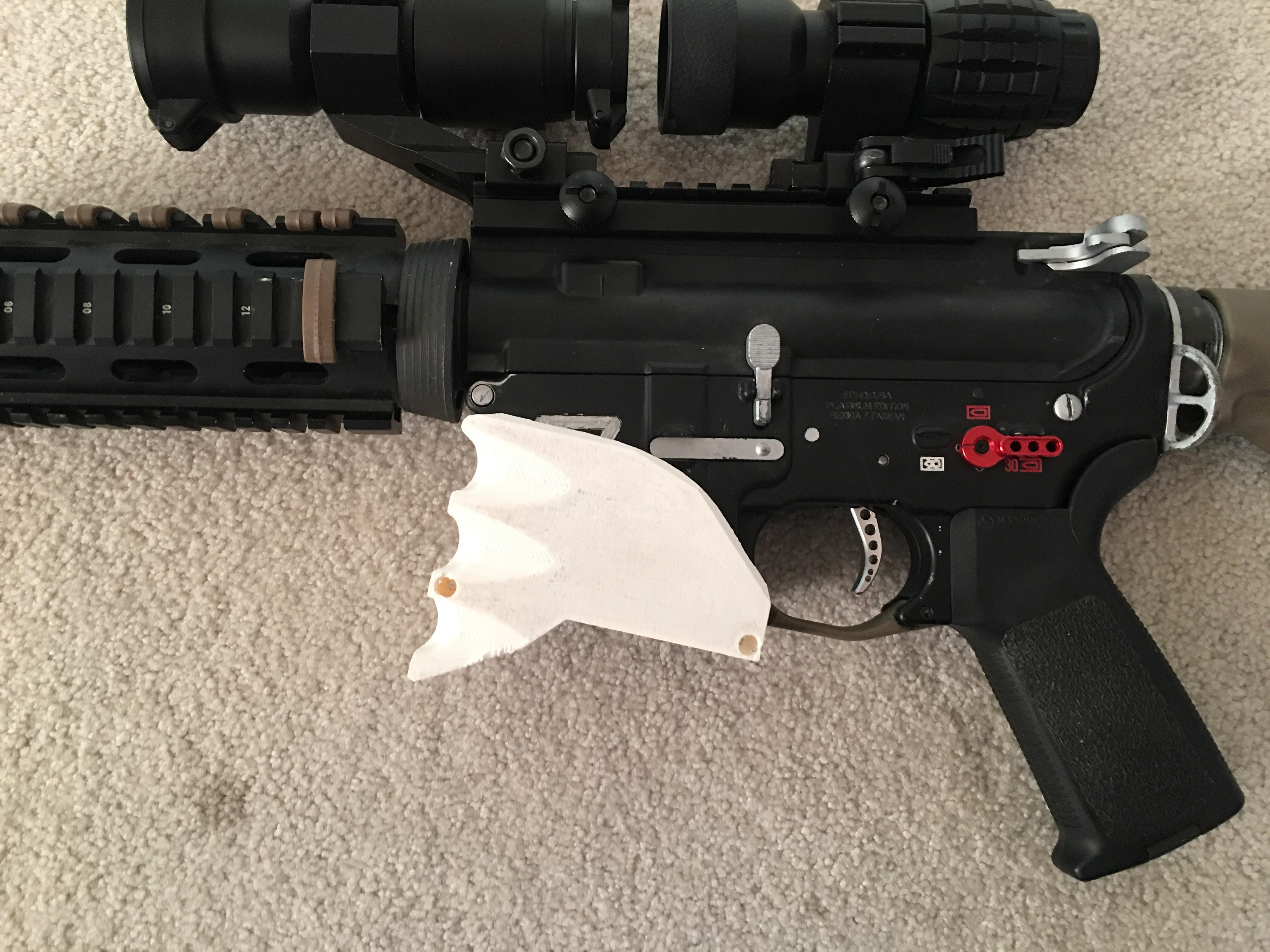 Airsoft m4 and ar15 style mag well grip
