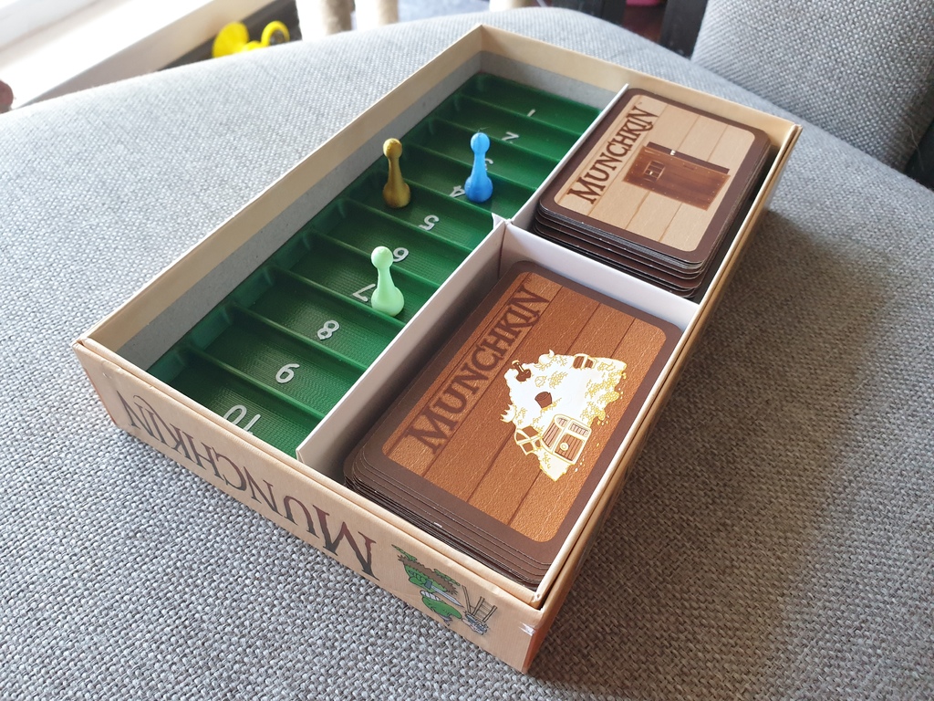 Munchkin board and magnetic pawn