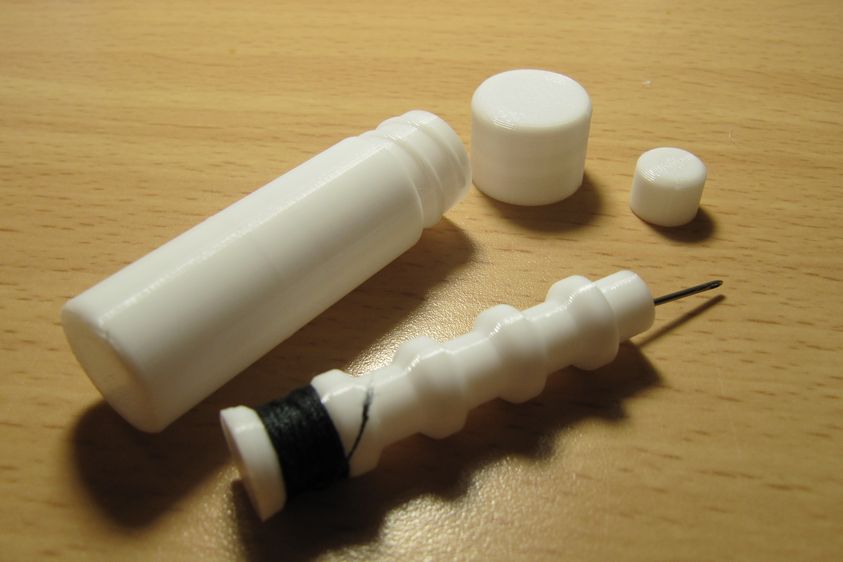 Lipstick-size sewing-set container