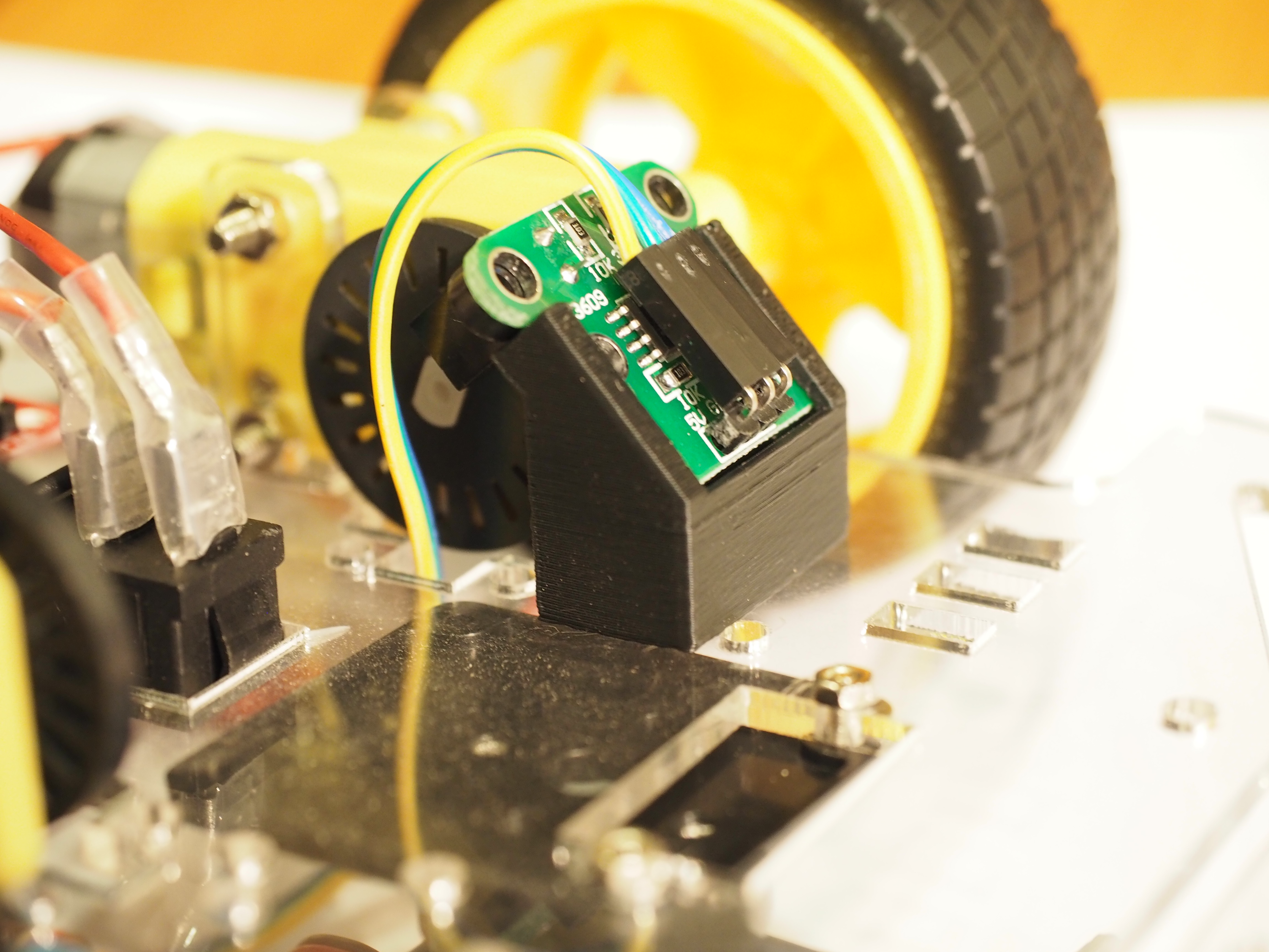 Photoelectric speed measuring sensor mounting bracket