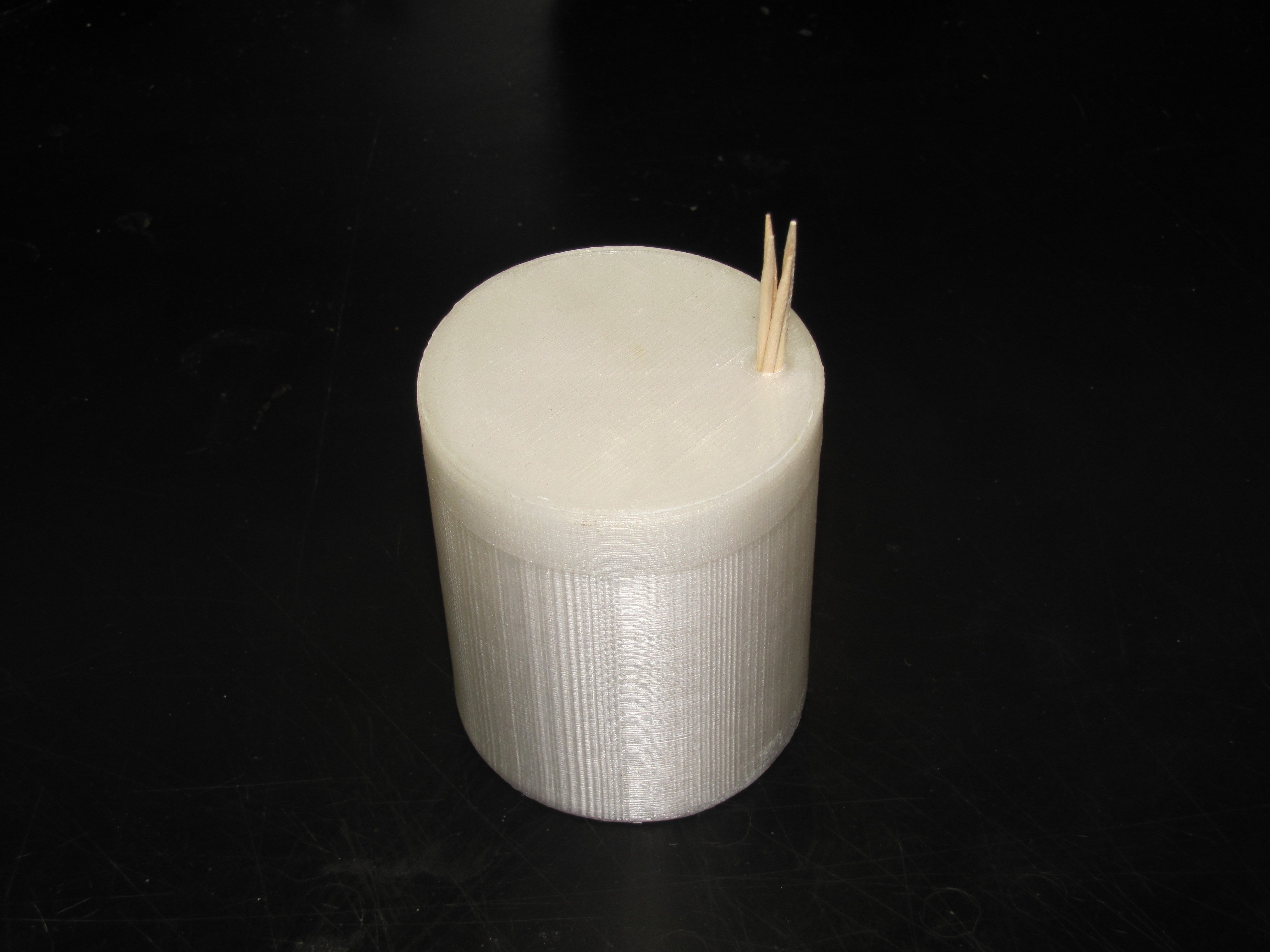 Toothpick holder with screw top