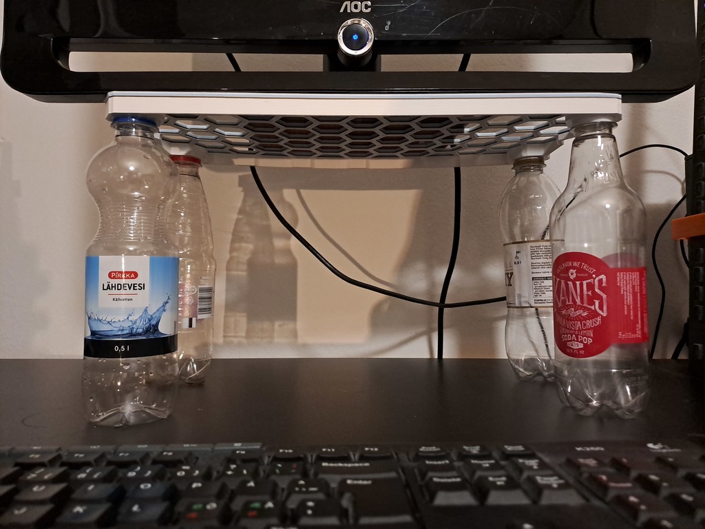 Monitor stand/riser with bottles as legs