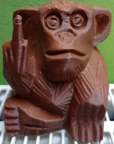 curved monkey with middle finger