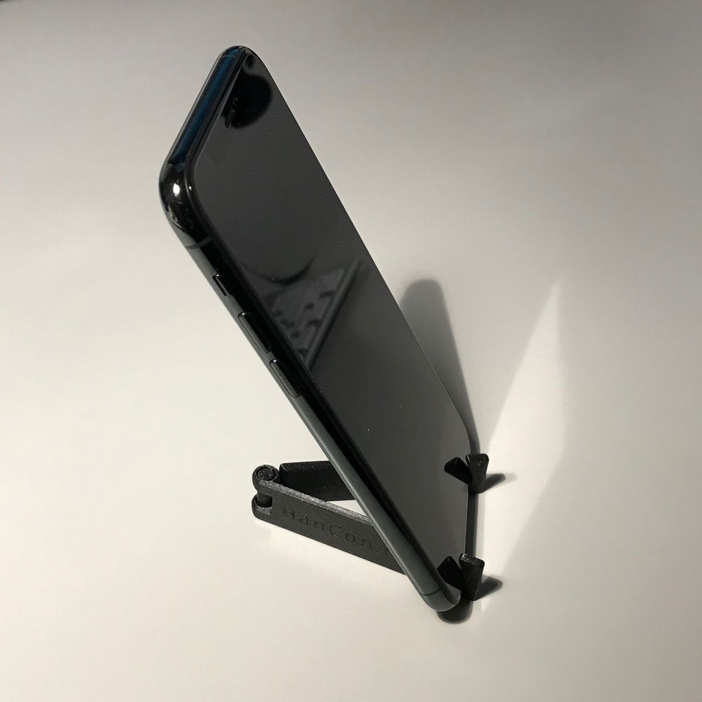 Foldable mobile phone stand / mount