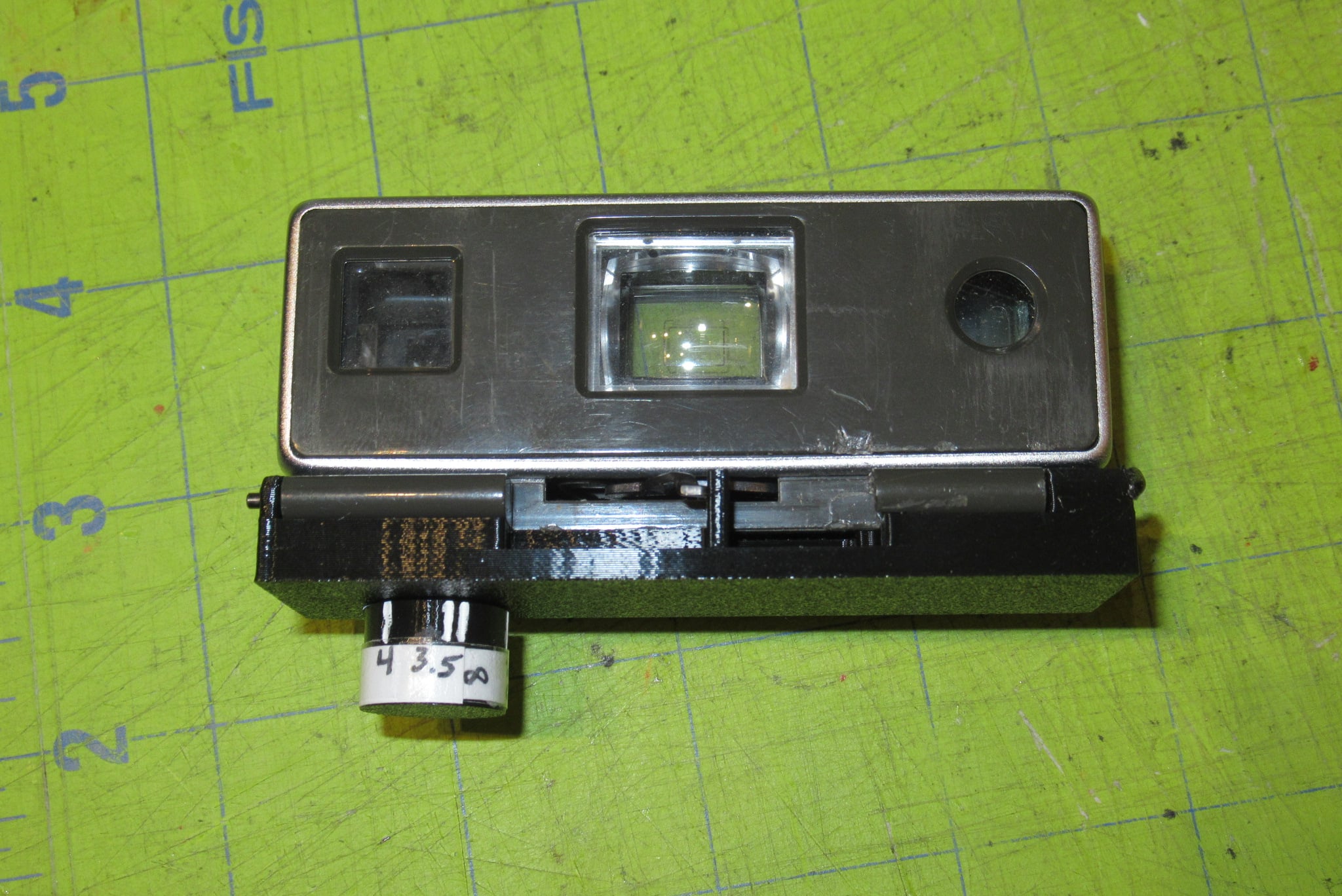 Polaroid folding stand alone range finder