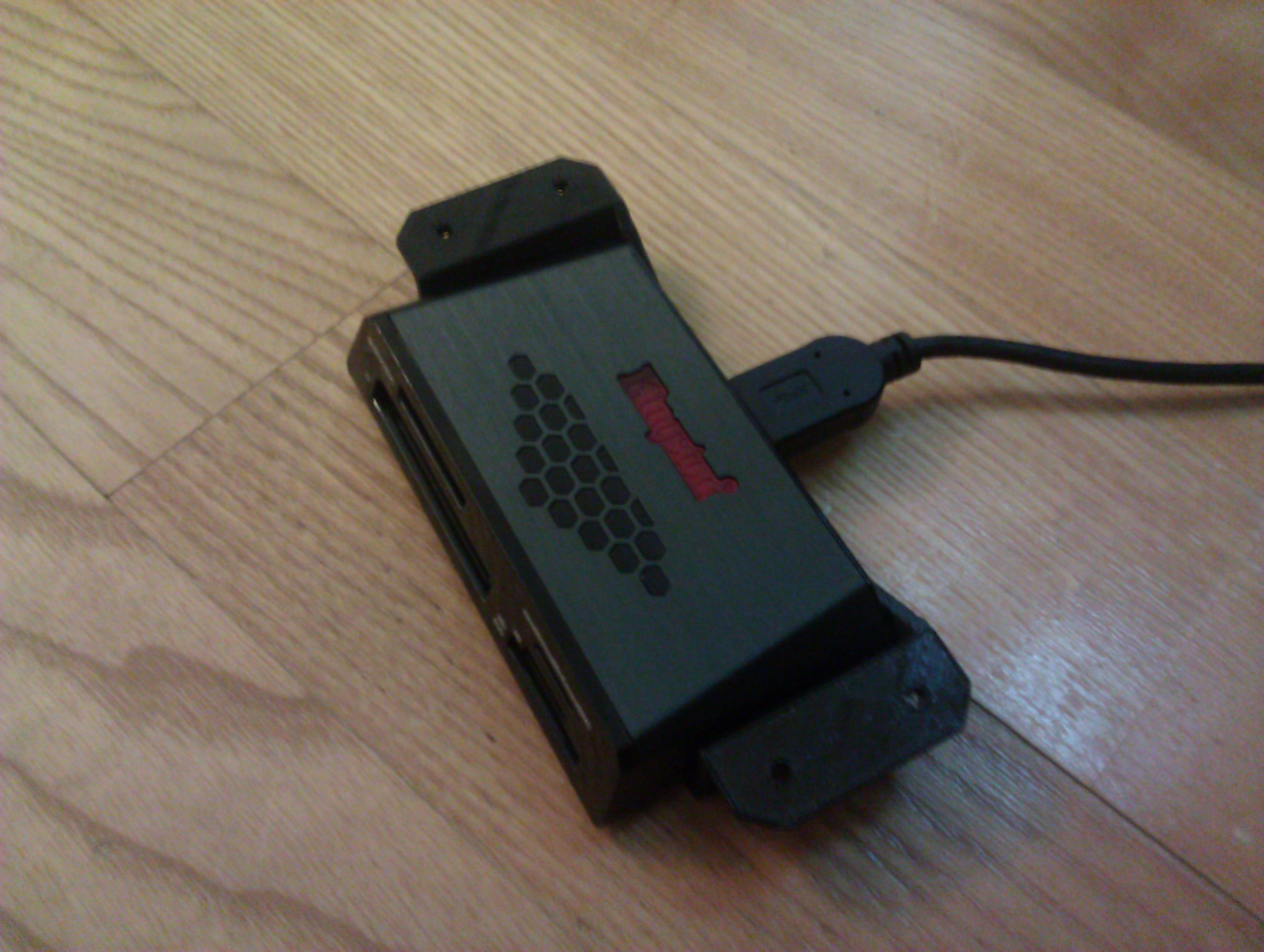 Table bottom mount for a Kingston memory card reader