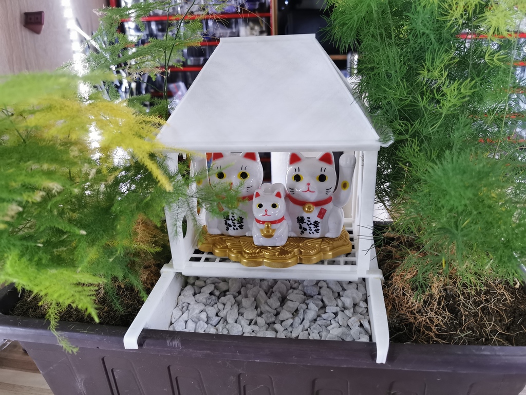 House for maneki neco on flower pot