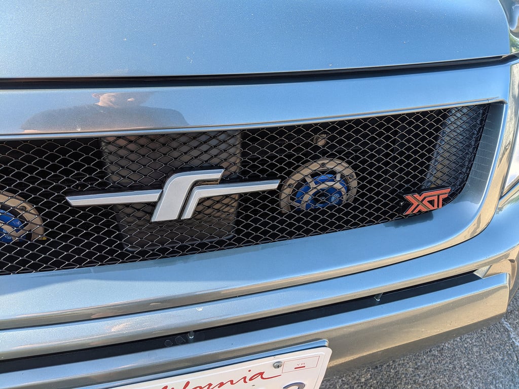 Subaru Forester JDM "F" logo and XT badge