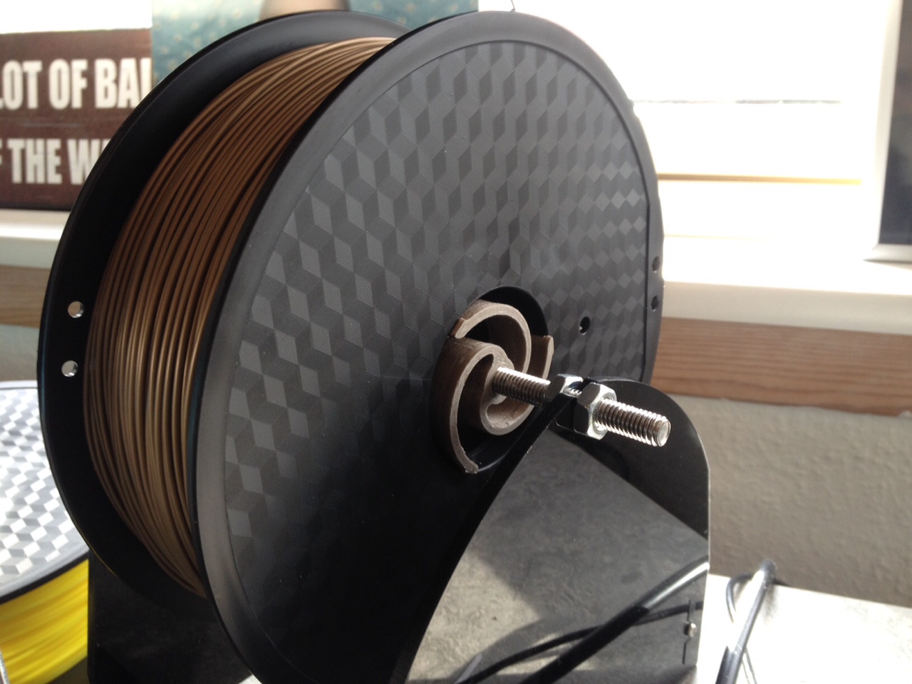 Spiral filament spool holder/hub