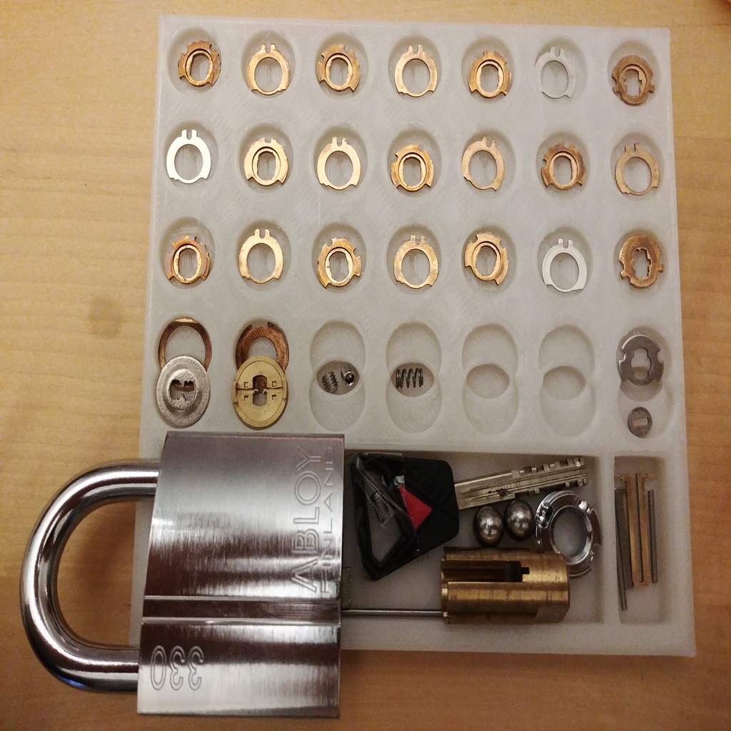 Pinning tray for disc detainer and pin tumbler locks