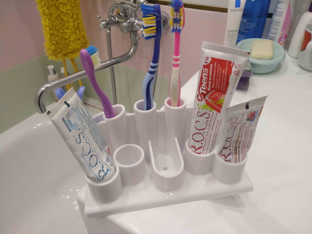 Organizer for toothbrushes and toothpaste.