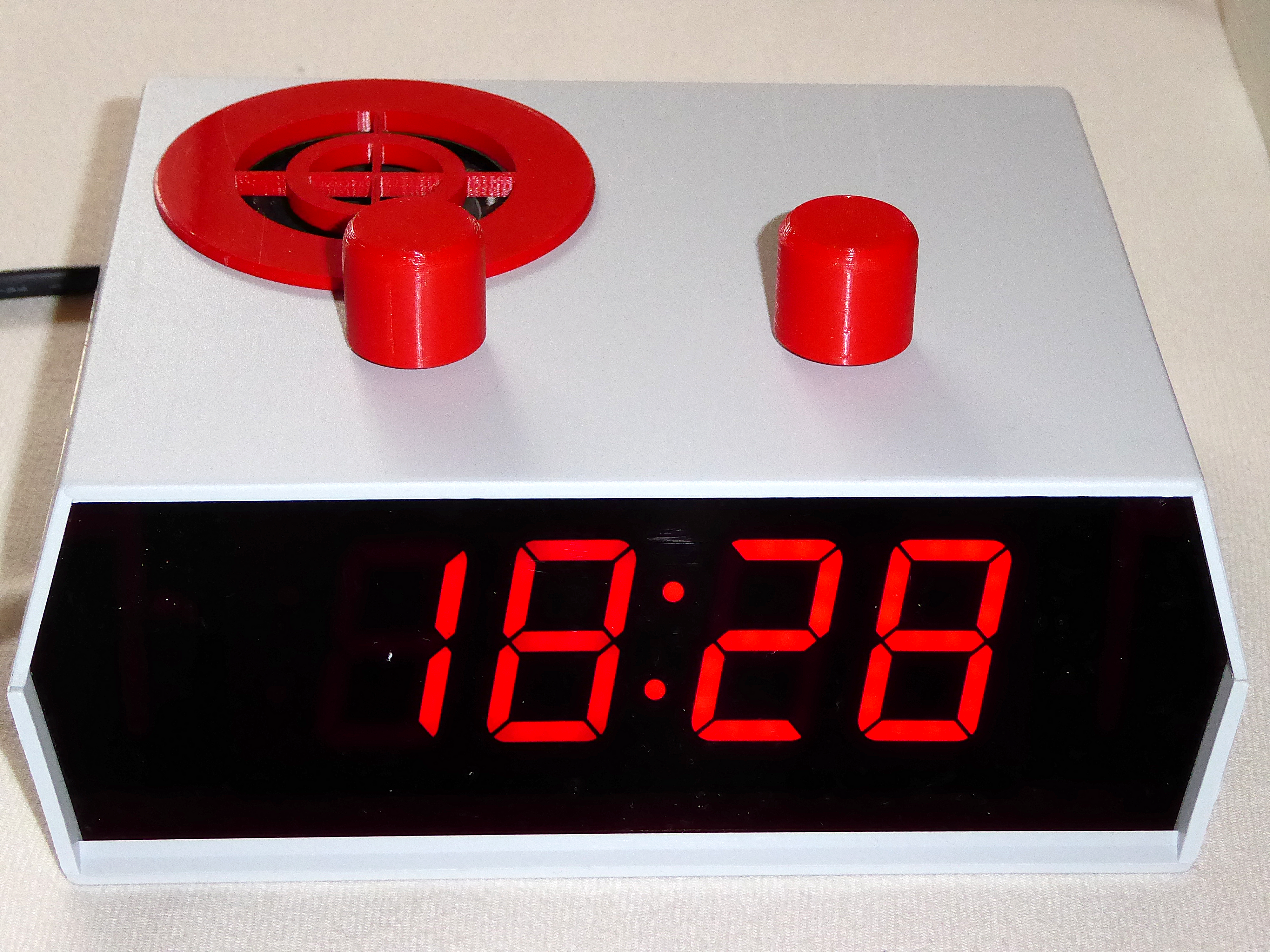 Efficient alarm clock with low electromagnetic radiation, big display and music player