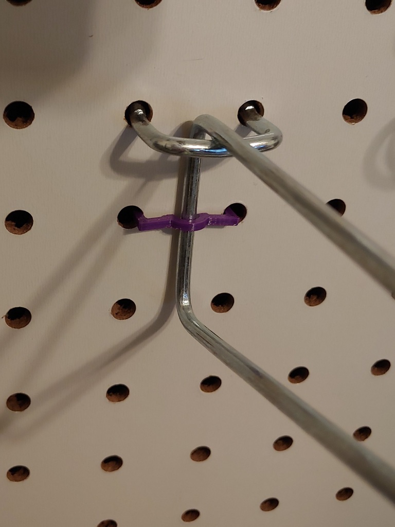 Two hole pegboard clip